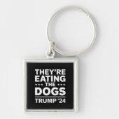 彼らは食べ犬のディベートおもしろいトランプ引用文 キーホルダー (正面)