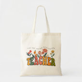 彼ら教えは彼らが成長するのを見て愛する。先生ギフト トートバッグ (正面)