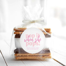 彼女が赤ポップ・アートのちゃんシャワーの贈り物をポップするときにピンクにする