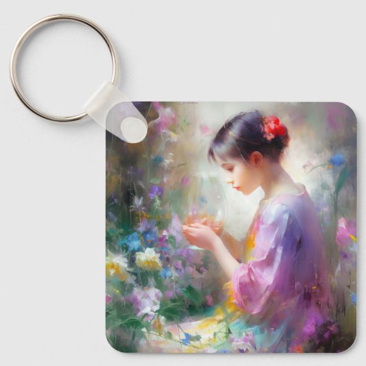 彼女の手の中の花を称賛する女の子 キーホルダー (正面)