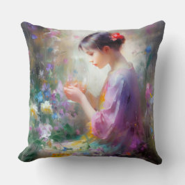 彼女の手の中の花を称賛する女の子 クッション