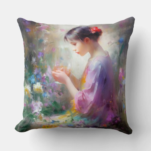 彼女の手の中の花を称賛する女の子 クッション (正面)