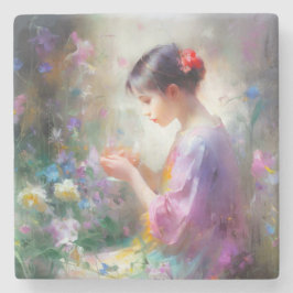 彼女の手の中の花を称賛する女の子 ストーンコースター