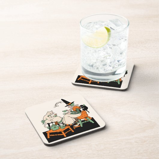 彼女の猫と茶を共有している30年代のハロウィンの魔法使い コースター (右側)