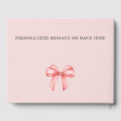 彼女はピンクの蝶結びのウェディングシャワーを計画中 ゲストブック (裏面)