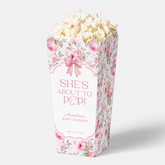 彼女はピンクボウの赤ポップ・アートのちゃんシャワーのポップコーンに近づいている フェイバーボックス (はじけた状態)