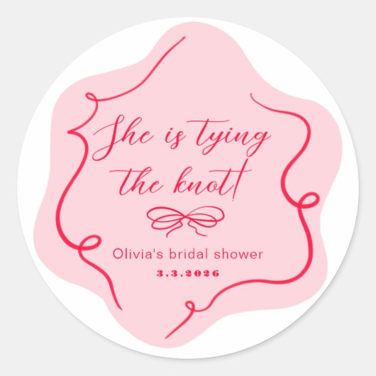 彼女はレトロなウェーブピンクと赤の結び目を作っている ラウンドシール (正面)