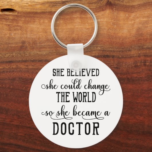 彼女は信じ世界医を変えることができた キーホルダー (正面)
