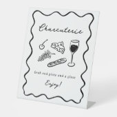 彼女は市場から出はっきりしたていお洒落る 台座サイン (正面)