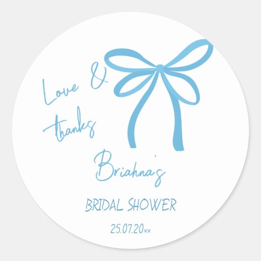 彼女は結び目の青いリボンの弓の恩恵を受けている ラウンドシール (正面)