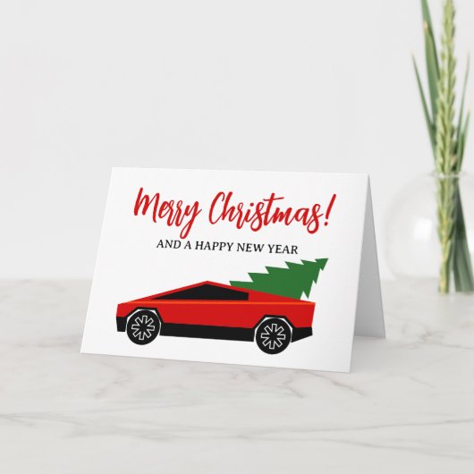 後部にクリスマスツリーが載った赤いテスラのトラック シーズンカード (正面)