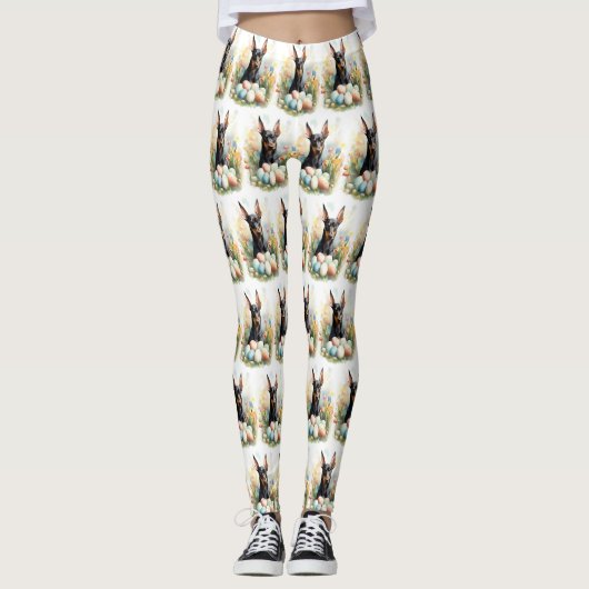 復活祭の卵を持つドーバーマン レギンス (正面)