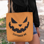 怖いハロウィーンのカボチャのちょうちんカスタムオレンジハローウィンパーティ トートバッグ<br><div class="desc">この不気味なオレンジ色のハロウィーントートバッグはトリックや治療のためのクール笑顔のハロウィーンのカボチャのちょうちんと自分のパーソナライズされた文字を備えている。トリックやカスタムトリートやパーティーの好意のために使用する可愛くて怖いパーティーバッグ。</div>