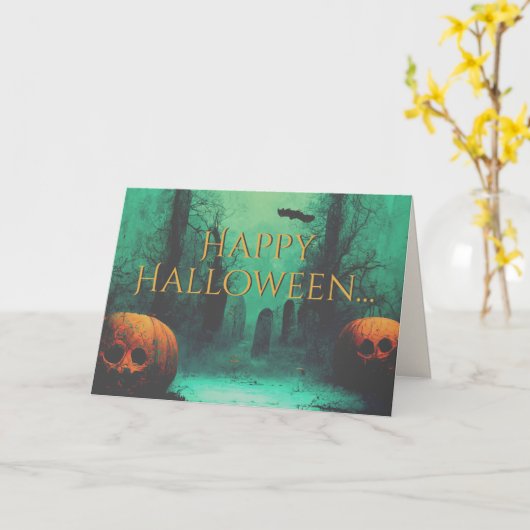 怖い墓地と彫られたカボチャのハロウィーン カード (黄色い花)