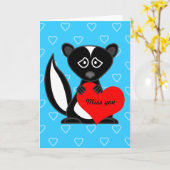 恋しく思You Card – 可愛い漫画のスカンク保持ハート カード (黄色い花)