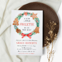 恋人がクッキーのクリスマスベビーシャワーを途中にある