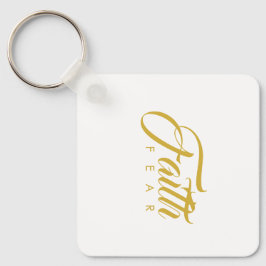 恐怖と白に対する金ゴールド キーホルダー