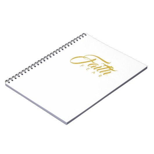 恐怖と白に対する金ゴールド ノートブック (左側)