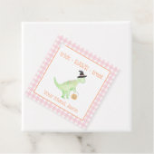 恐竜がラワーピンクのオレンジハロウィンキッズを扱う フェイバータグ (インサイチュ)