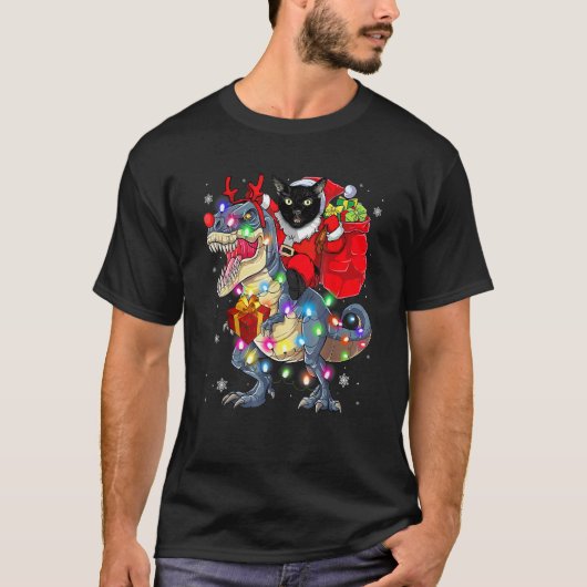 恐竜に乗るネコのクリスマス Tシャツ (正面)