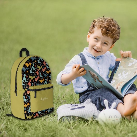 恐竜のパターン黒い黄色のライム名 プリントバックパック