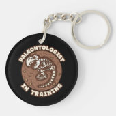 恐竜の化石を訓練する古生物学者 キーホルダー (裏面)