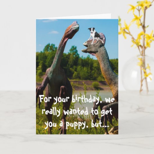 恐竜の子犬のユーモア カード (黄色い花)