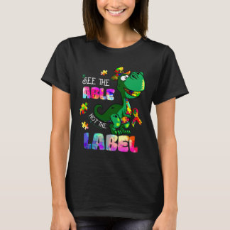 恐竜の自閉症のラベルが待ち受けていないのを見る Tシャツ
