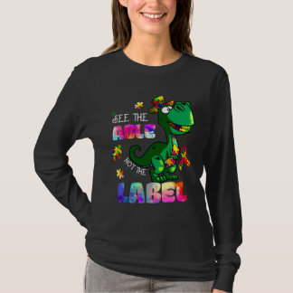 恐竜の自閉症のラベルが待ち受けていないのを見る Tシャツ