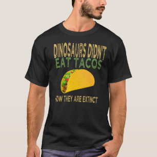恐竜は現在タコス食べは絶滅していない Tシャツ