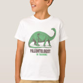 恐竜トレーニング中の古生物学者Tシャツ 子供用 Tシャツ (正面)