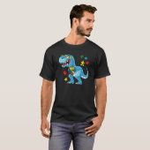 恐竜レックス自閉症啓発月間パズルピースS Tシャツ (正面フル)