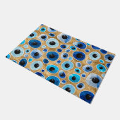 悪い眼のパターンが石を転がして金ゴールド ドアマット (アングル)