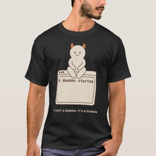 悪魔じゃない、デーモンだ Unix/Linuxジョーク Tシャツ (正面)
