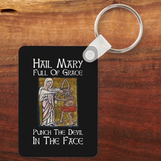 悪魔を顔で! キーホルダー (裏面)