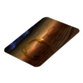 惑星を形成する材料の円盤は星を回る。 マグネット (左側)