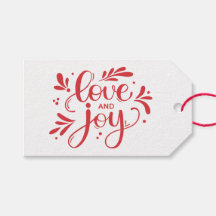 愛と喜び。赤いクリスマススクリプトの書道