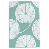 愛についてタコしよう |ティール(緑がかった色)ライムパターン ミディアムペーパーバッグ (正面)