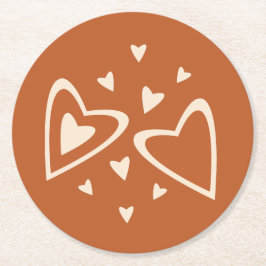 愛の幾何学 - 赤赭色の上のクリーム - 画像。 ラウンドペーパーコースター