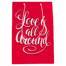 愛はすべてのスクリプトのまわりにレタリングピンク