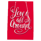 愛はすべてのスクリプトのまわりにレタリングピンク ミディアムペーパーバッグ (裏面)