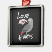 愛はアフリカのグレイのオウムのバレンタインデーを傷つける メタルオーナメント (左)