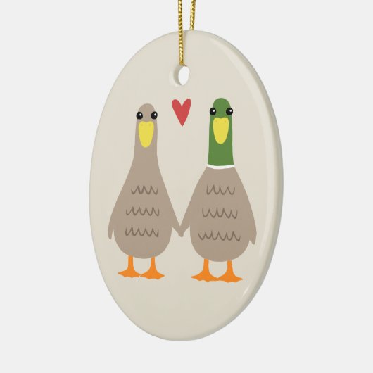 愛はカップルの記念品を引込めます セラミックオーナメント (左)