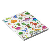 愛らしいおもしろいカラフルシームレスパターン恐竜 ノートパッド (アングル)