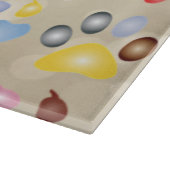 愛らしいカラフル犬の手のプリント，《写真》ぼけ味 カッティングボード (角)