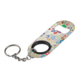 愛らしいカラフル犬の手のプリント，《写真》ぼけ味 キーホルダー栓抜き (正面アングル)