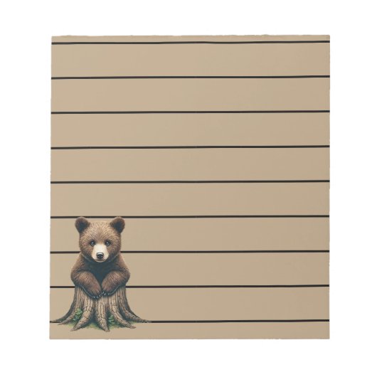愛らしいクマの子座って木の切り株 ノートパッド (正面)