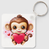 愛らしいベビーモンキーホールディング赤いハート キーホルダー (裏面)
