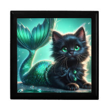 「愛らしい黒人人人魚の子猫と緑の目」