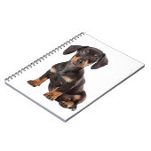 愛ダックスフントの子犬の黒及びタン犬 ノートブック (左側)